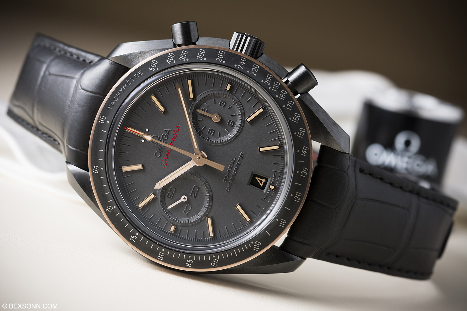 omega speedmaster black and gold